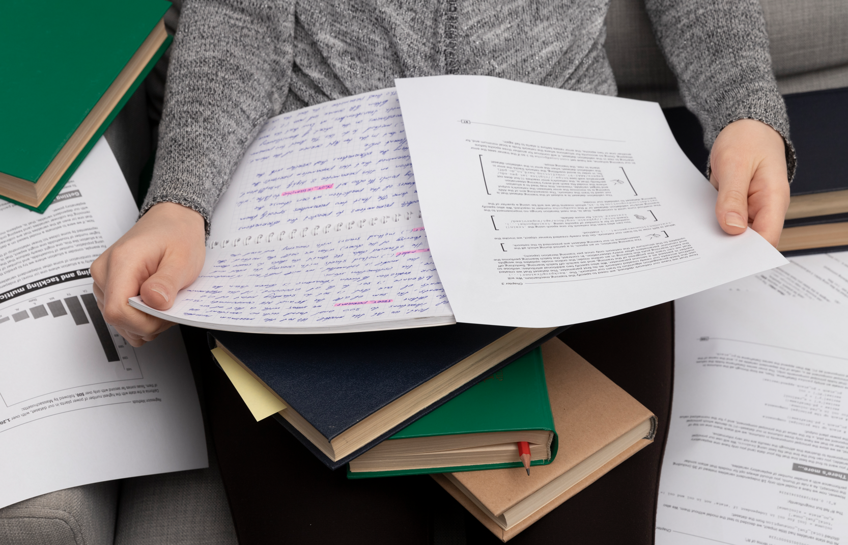 research papers on someone's lap
