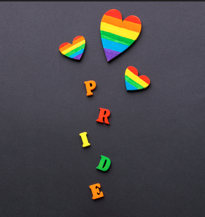 Rainbow image of word PRIDE with hearts