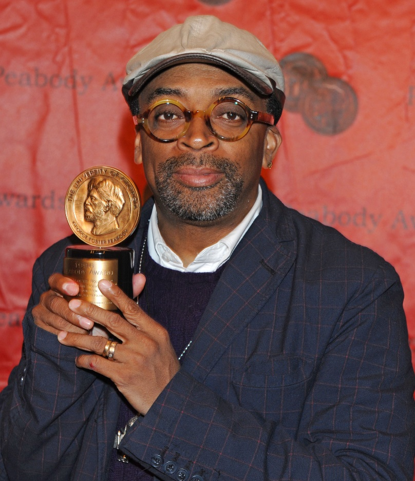 Spike Lee holding an award