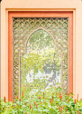 islamic style window into beautiful garden