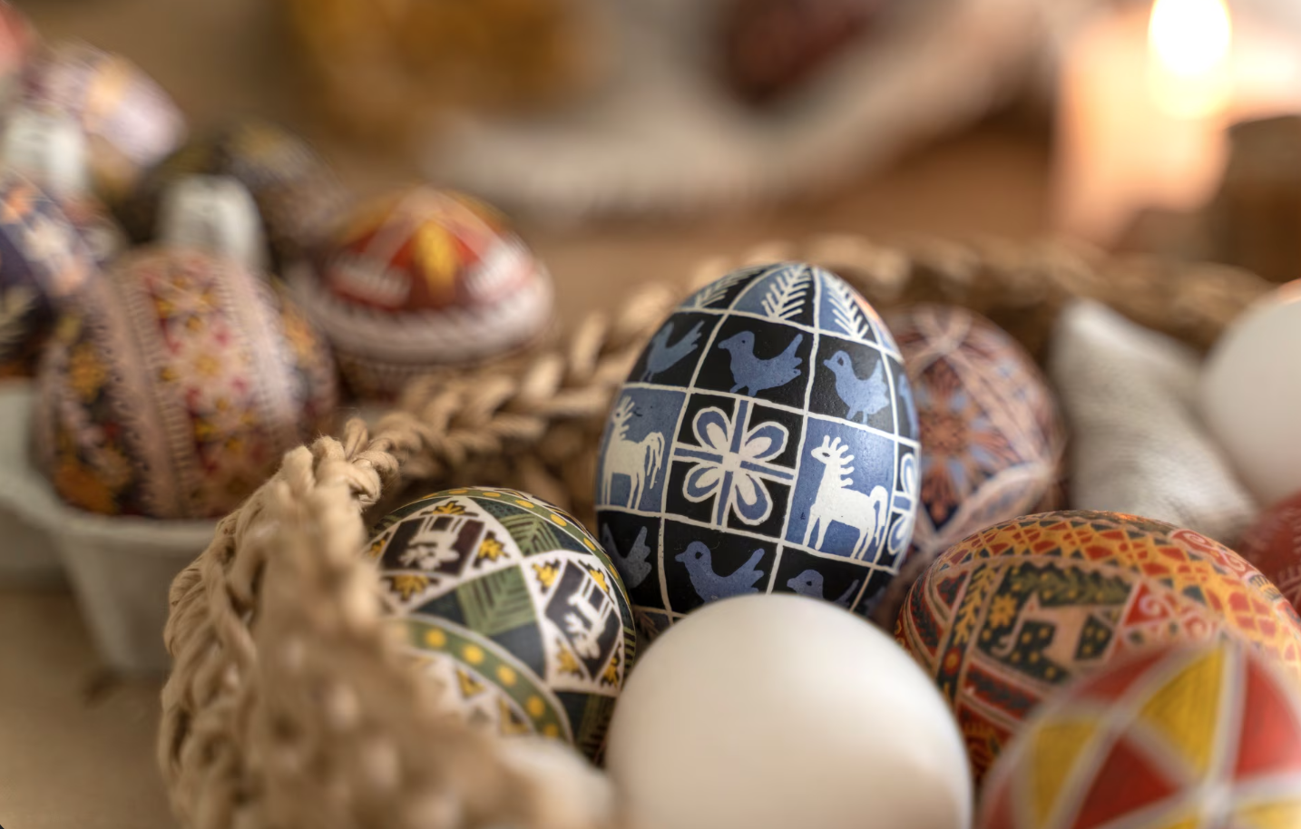 decorated easter eggs in a home made basket