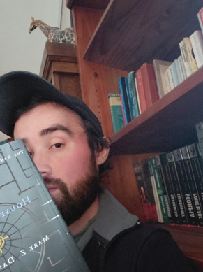 author student tudor in a library