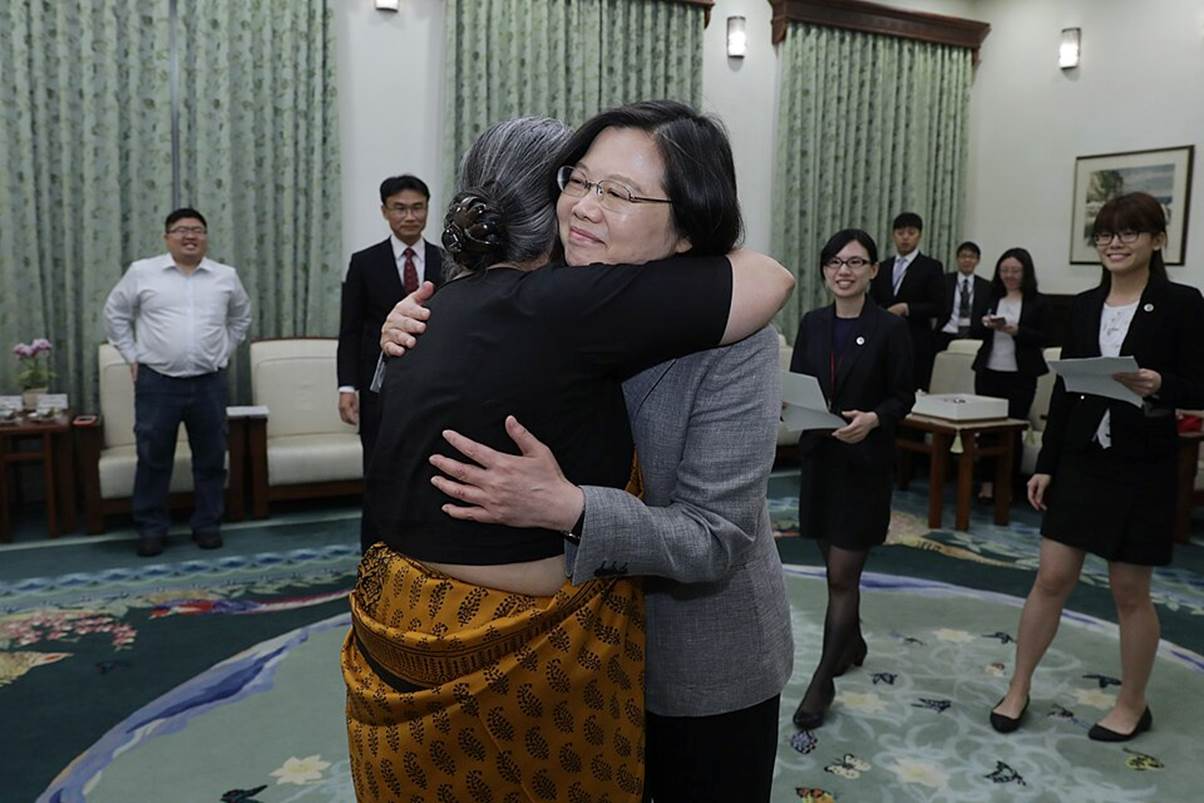 President Tai hugging Bangladesh PM