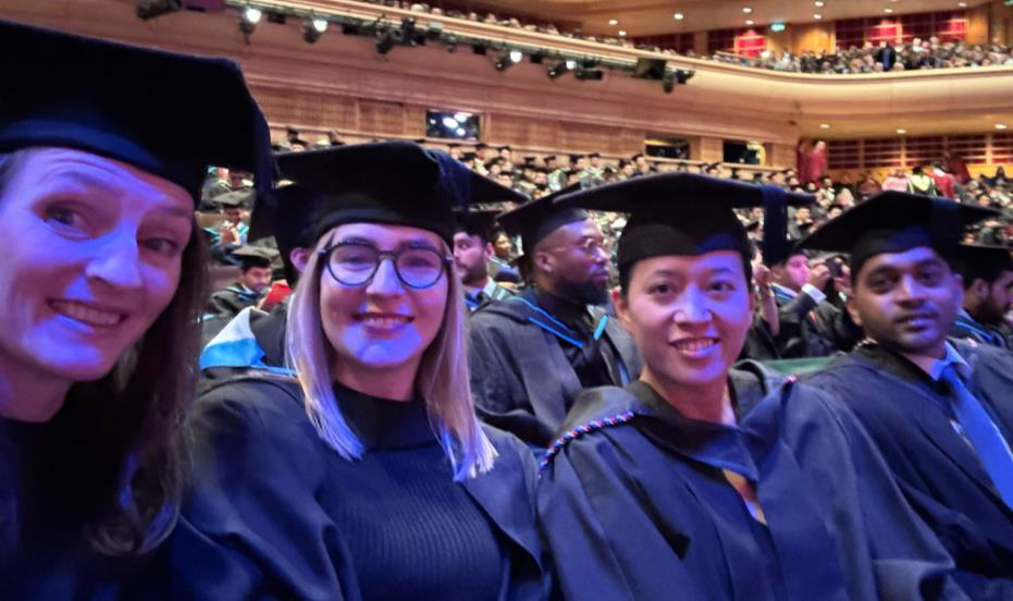 Santi with friends at gradution, u o l