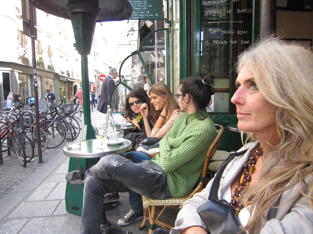 Women at Paris sidewalk cafe